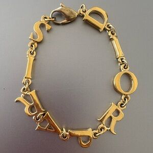 Dior D I O R P A R I S Gold Charm Bracelet with Letter Accents